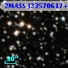 2MASS J23570617+5640322