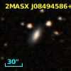 2MASX J08494586+0100376