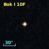 2MASS J01112299-2834272