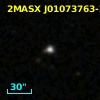 2MASX J01073763-2037476