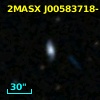 2MASX J00583718-1838586