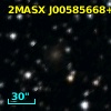 2MASX J00585668+6001402
