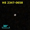 2MASS J23495642-0641548