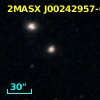 2MASX J00242957-0055497