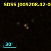 2MASS J00520842-0051346