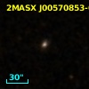 2MASX J00570853-0129386