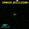 2MASX J01112588-0004280