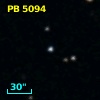 2MASS J22101577+0011537