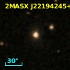 2MASX J22194245+0150098