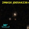2MASX J00544236+0038039