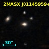 2MASX J01145959+0015330