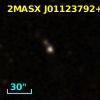 2MASX J01123792+0005109