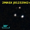 2MASX J01232942+0034074
