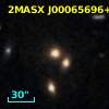 2MASX J00065696+0306474