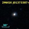 2MASX J01373387+0349452