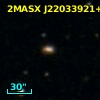 2MASX J22033921+0557531