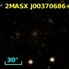 2MASX J00370686+0909236