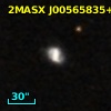 2MASX J00565835+0901417