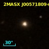 2MASX J00571809+1228340