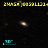 2MASX J00591131+1113278
