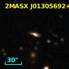 2MASX J01305692+1132410