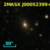 2MASX J00052399+1613091