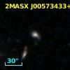 2MASX J00573433+1411351