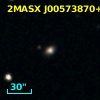 2MASX J00573870+1846019