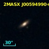 2MASX J00594990+1820472