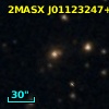 2MASX J01123247+1833168