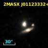 2MASX J01123332+1632501