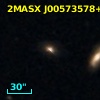 2MASX J00573578+1951139