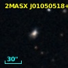 2MASX J01050518+2154427