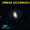 2MASX J22190632+2435537