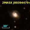2MASX J00394479+3309293