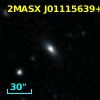 2MASX J01115639+3228023