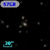 87GB 015423.1+315941