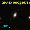 2MASX J00295673+3700470