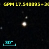 2MASS J01101165+3629472