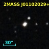 2MASS J01102029+3605389