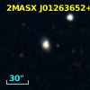 2MASX J01263652+3811047