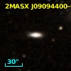 2MASX J09094400-0943563