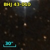 2MASS J22573259+6220289