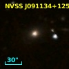 2MASX J09113476+1255377