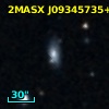 2MASX J09345735+1809599