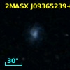 2MASX J09365239+0308143