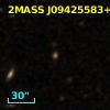 2MASS J09425583+0032026