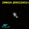 2MASX J09522652+1112402