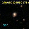 2MASX J09550178+0058102