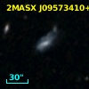 2MASX J09573410+3603597